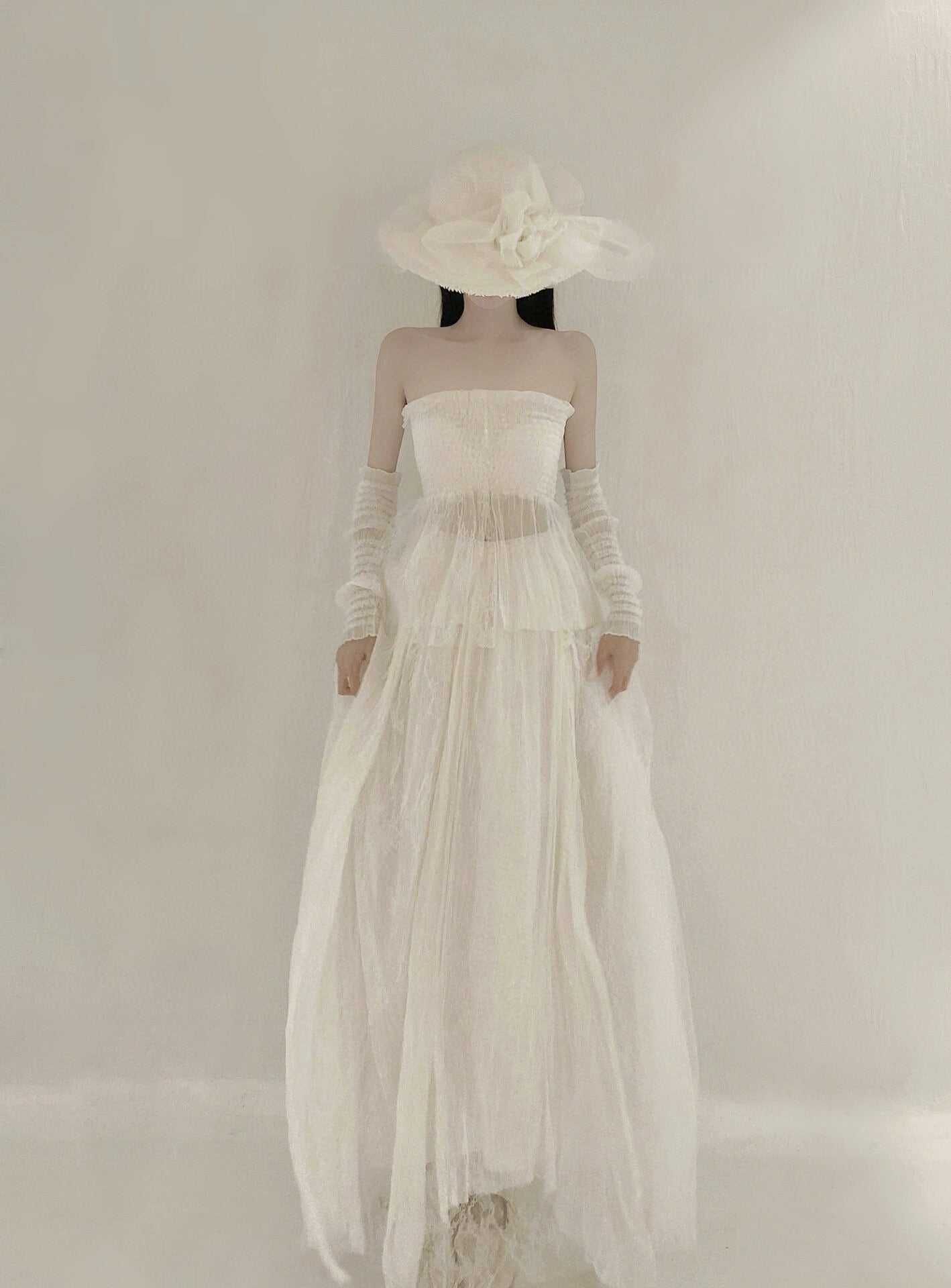 White lace-up top and skirt set with sleeves